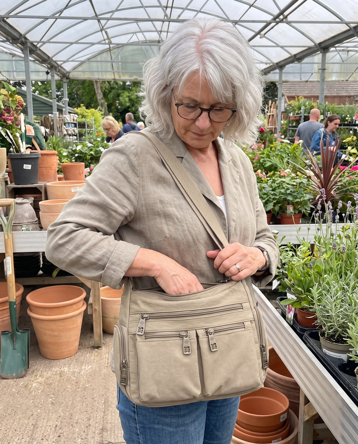 Kia crossbody bag in khaki at the garden centre