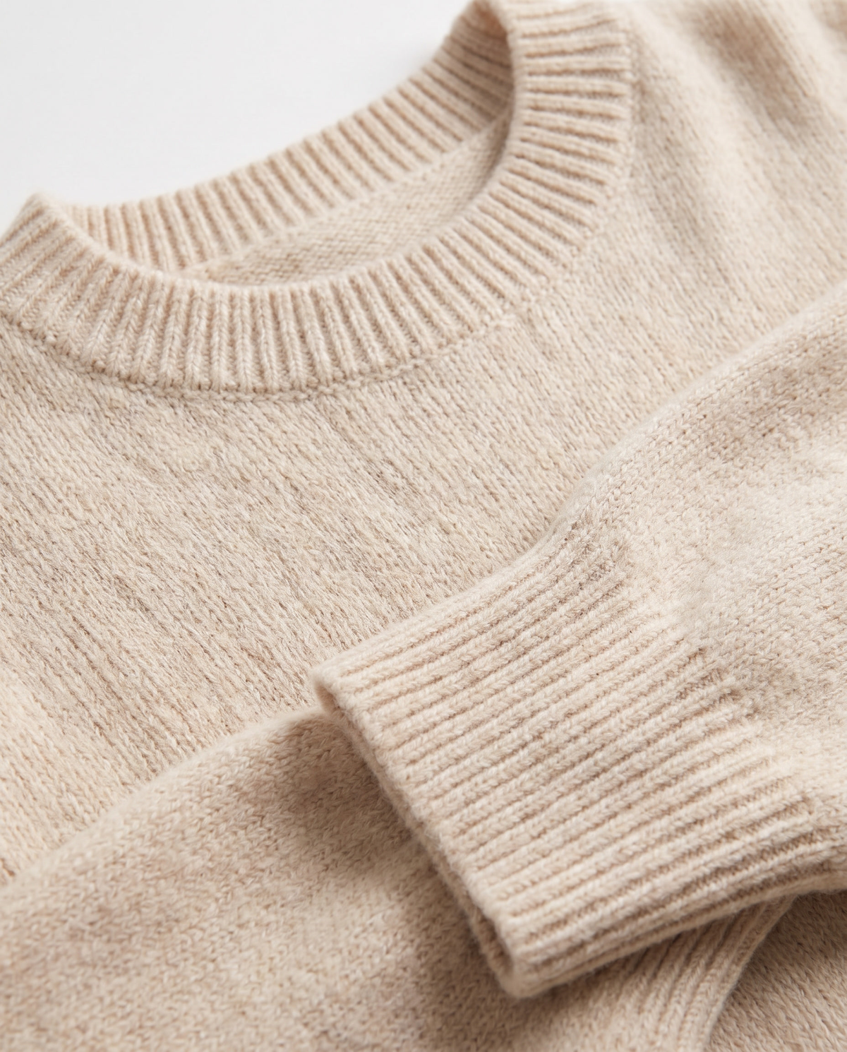 Maris drape sweater, close-up of the knit, neckline and cuff