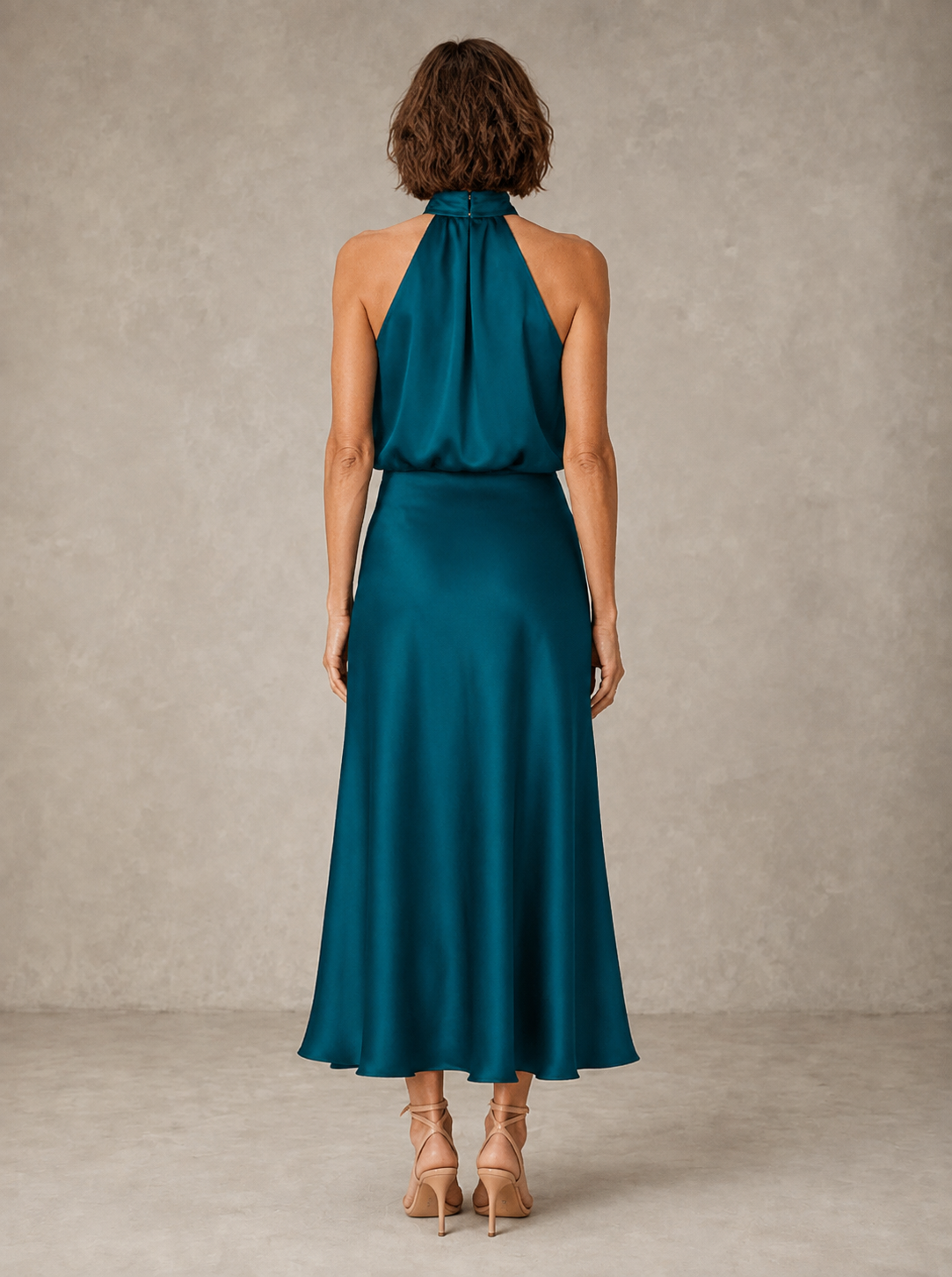 Halter neckline detail on satin evening dress