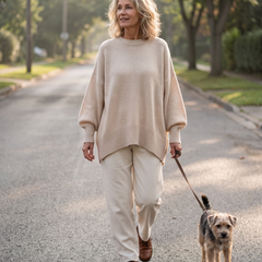 Maris drape sweater in apricot on a morning walk