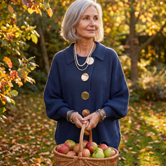 Karina collared button cardigan in blue, buttoned up, in the garden