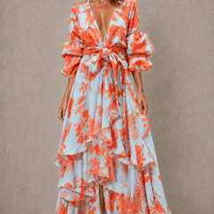 Orange tiered floral maxi dress with bow belt