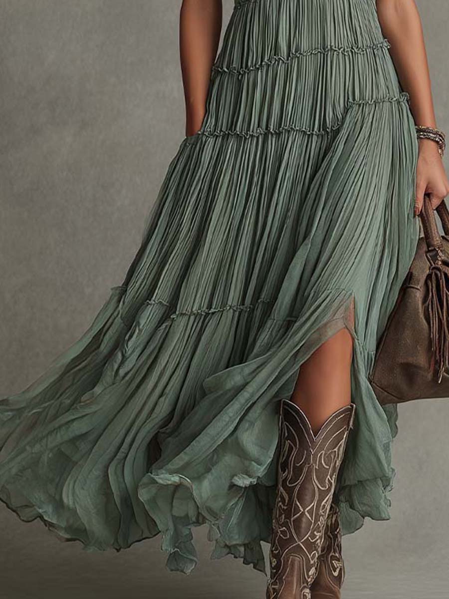 Pleated V-neck maxi dress worn