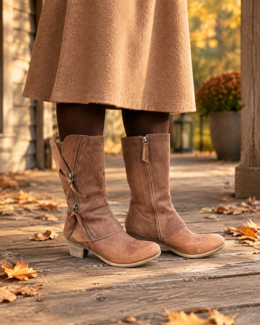 Amparo boots worn with a midi skirt