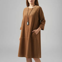 Amy corduroy midi dress in brown on the model