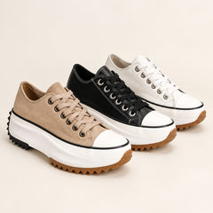 Bettina in tan, black and white