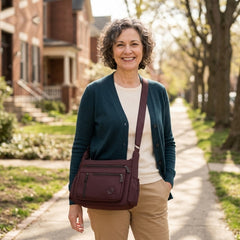Iris crossbody bag worn across the body