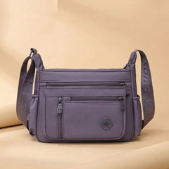 Iris everyday crossbody bag in purple
