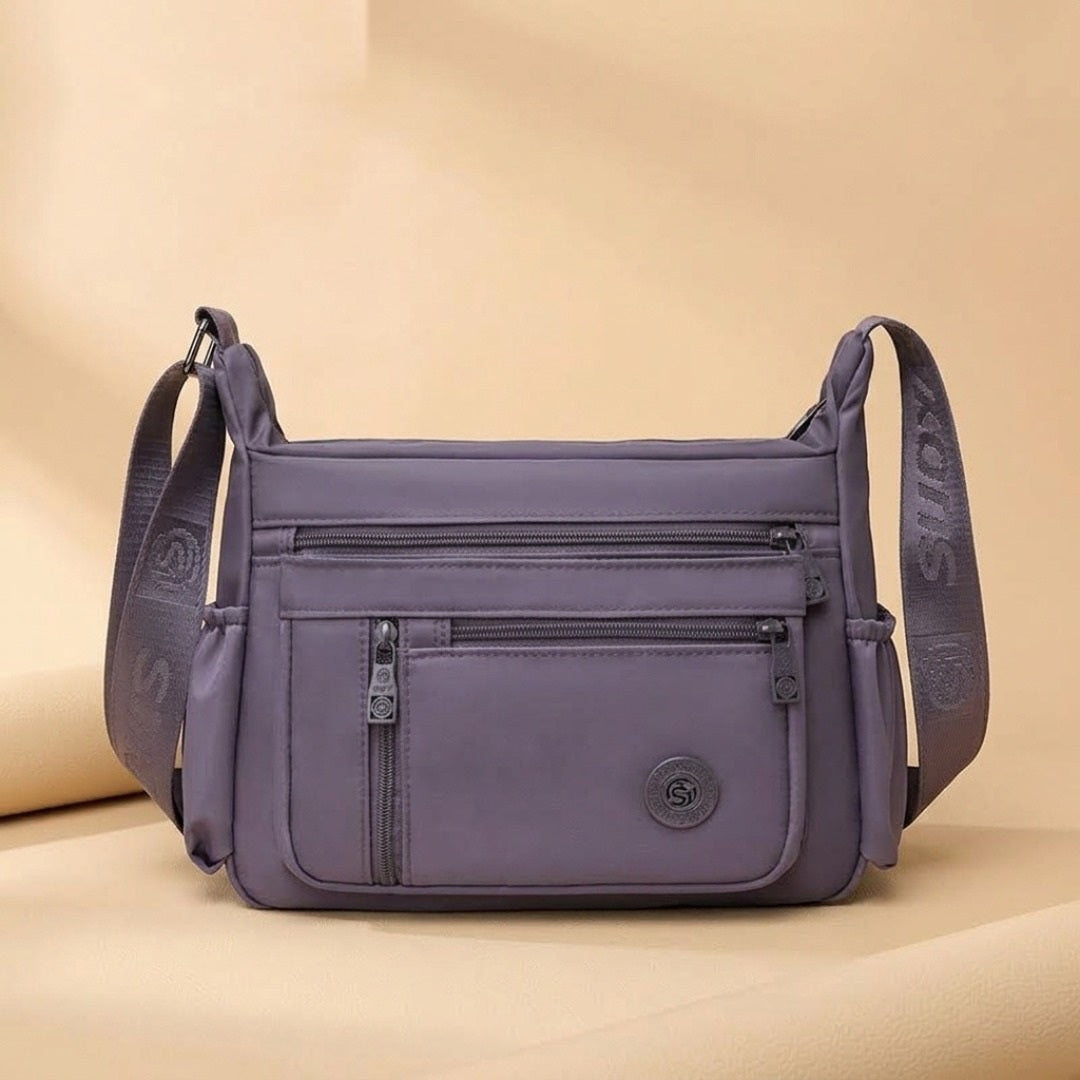 Iris everyday crossbody bag in purple
