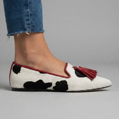 Moccasin — Black and White Cow Print, Red Tassels