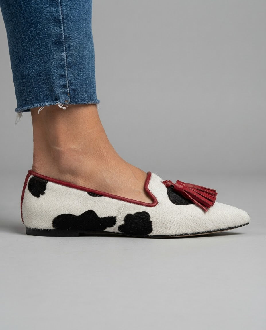 Moccasin — Black and White Cow Print, Red Tassels