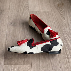 Moccasin — Black and White Cow Print, Red Tassels