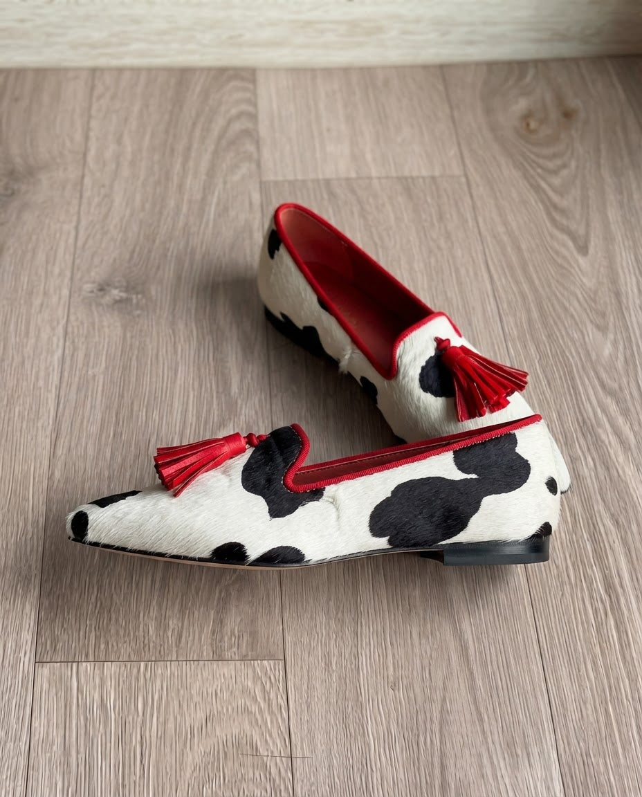 Moccasin — Black and White Cow Print, Red Tassels