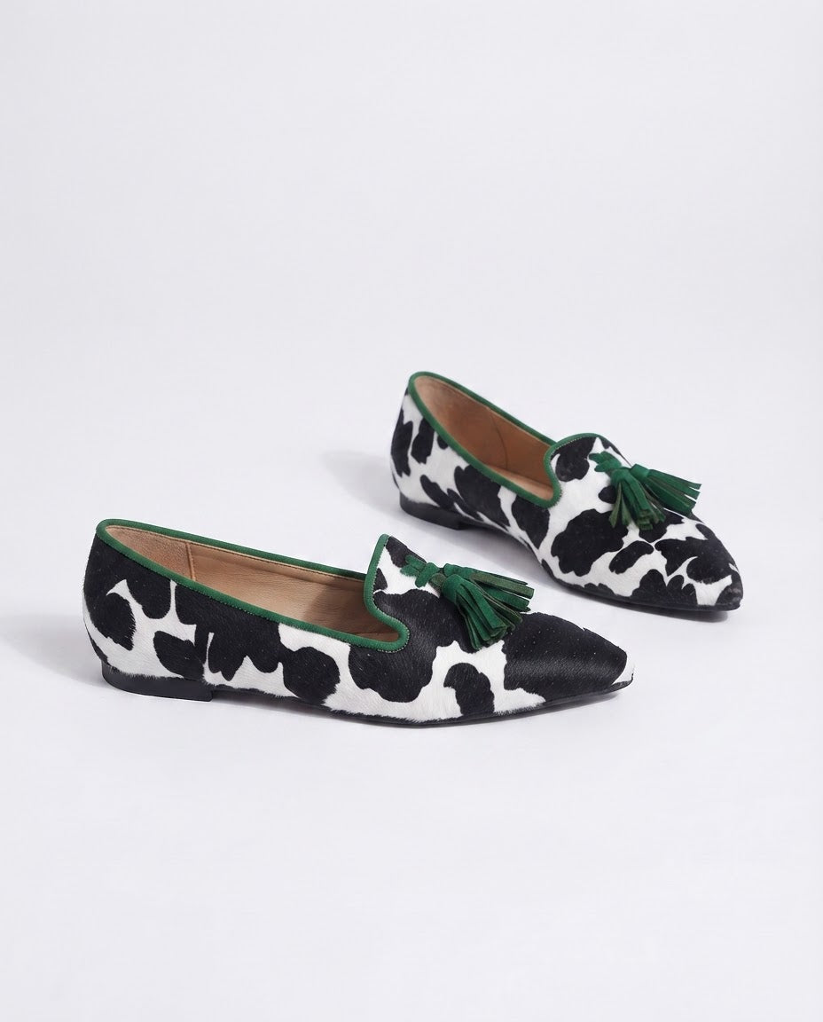 Moccasin — Black and White Cow Print, Green Tassels